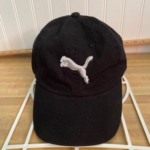 Preowned Men’s “ Puma “ Hat/Cap. Adjustable Black with Silver Logo.